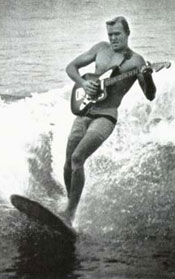 dick dale surfing with a guitar